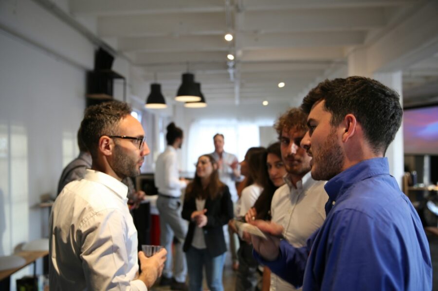 People talking together at a networking event
